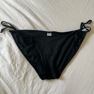 Victoria’s Secret swim black bikini bottom with tie straps. Size SMALL.
